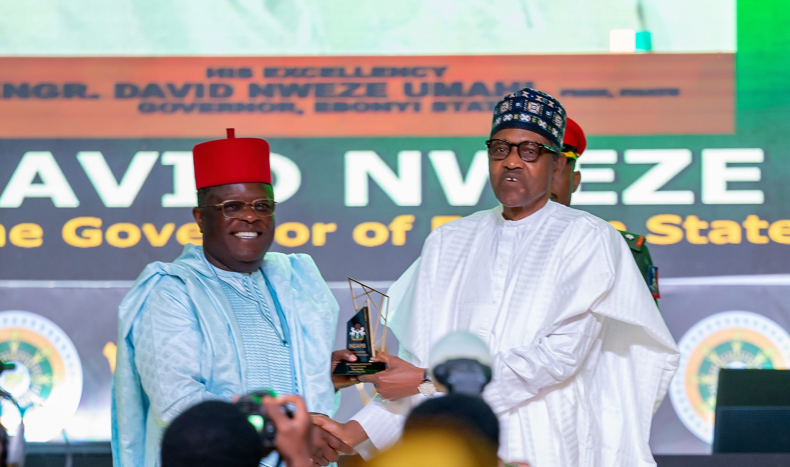 HE Presdient Muhammadu Buhari presenting the award for Agricultural Development to HE Ifeanyi Ugwuwanyi of Nasarawa State