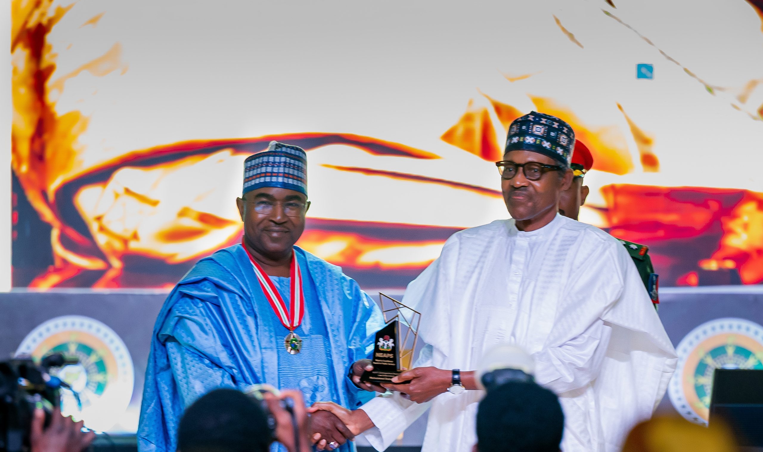 HE Presdient Muhammadu Buhari presenting the award for Drug Law Enforcement to NDLEA Chairmna, Brig.Gen Buba Marwa (Rtd)